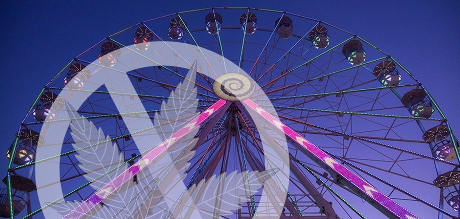 Cannabisverbot Cannabisverbotsgrafik vor einem Riesenrad